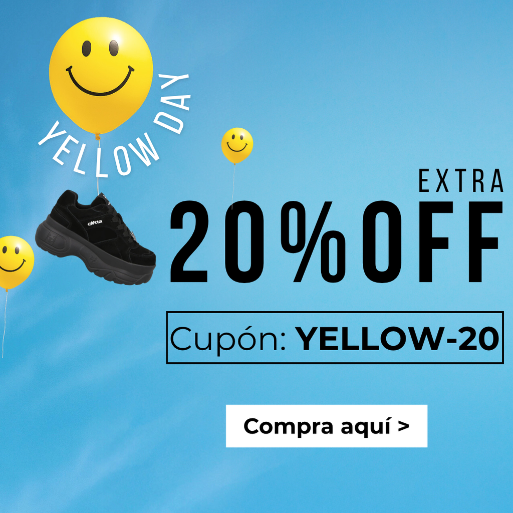Banner promocional de Yellow Day con fondo azul cielo. Aparecen tres globos amarillos con caras sonrientes que sostienen distintos zapatos: una bota café, una sandalia negra con aplicaciones y unos tenis negros de plataforma. A la derecha se lee: “Extra 20% OFF” y “Cupón: YELLOW-20”. En la parte inferior hay un botón con el texto “Compra aquí >”. Promoción válida por Yellow Day.